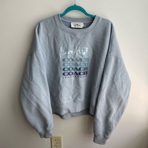 Flared Coach Sweater